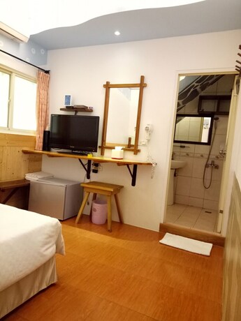 Imagen de la habitación del Hotel Nanwan Xing Zhan. Foto 26