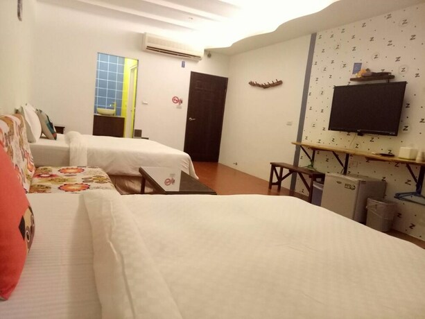 Imagen de la habitación del Hotel Nanwan Xing Zhan. Foto 28