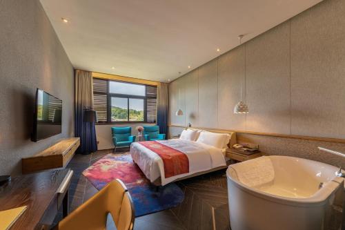 Imagen de la habitación del Hotel Nanxianglou Art. Foto 16
