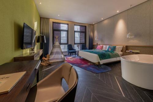 Imagen de la habitación del Hotel Nanxianglou Art. Foto 18