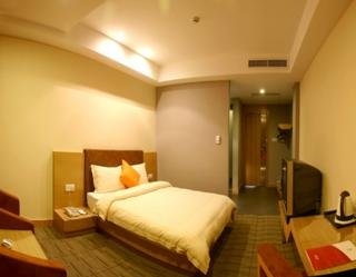 Imagen de la habitación del Hotel Nanyuan Inn Beilun. Foto 1