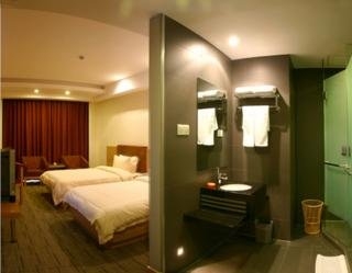 Imagen de la habitación del Hotel Nanyuan Inn Beilun. Foto 2