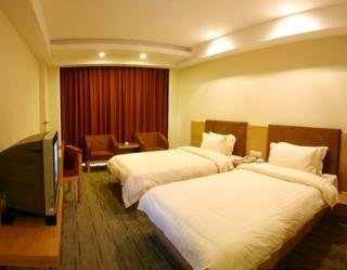 Imagen de la habitación del Hotel Nanyuan Inn Beilun. Foto 3