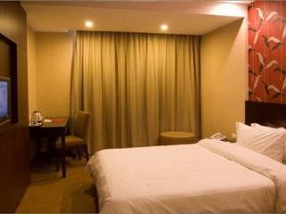 Imagen de la habitación del Hotel Nanyuan Inn Fengqi. Foto 1