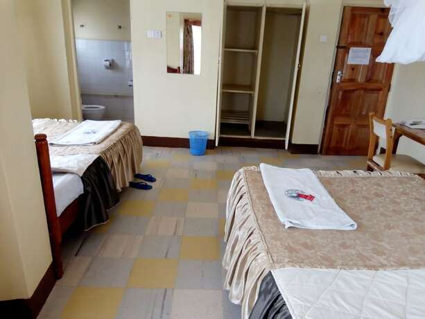 Imagen de la habitación del Hotel Nanyuki Simba Lodge. Foto 14