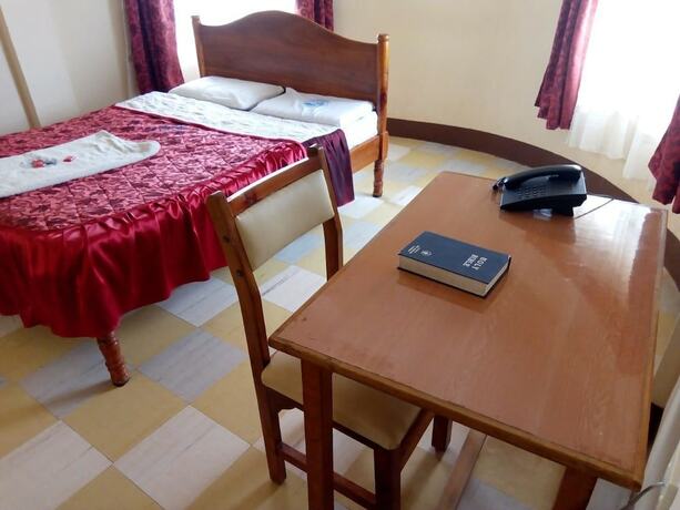 Imagen de la habitación del Hotel Nanyuki Simba Lodge. Foto 17
