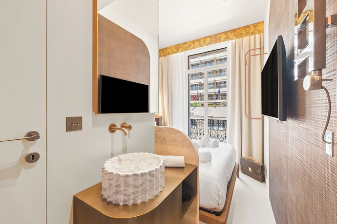Imagen de la habitación del Hotel Naomi Cannes. Foto 9