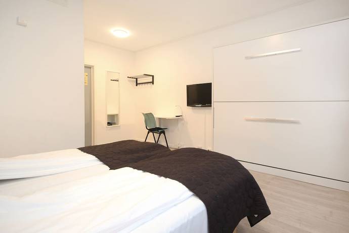 Imagen de la habitación del Hotel Napoli resturant andl. Foto 14