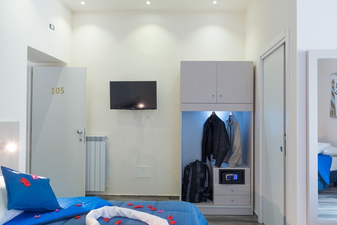 Imagen de la habitación del Hotel Napoli's Gold. Foto 16