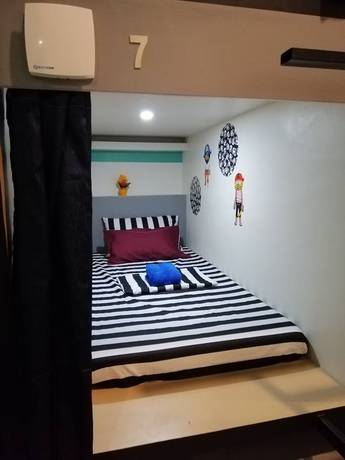 Imagen de la habitación del Hotel Napsule Suites Davao. Foto 6