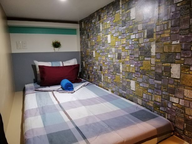 Imagen de la habitación del Hotel Napsule Suites Davao. Foto 7