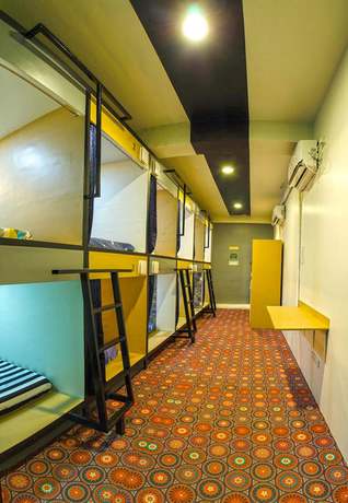 Imagen de la habitación del Hotel Napsule Suites Davao. Foto 15