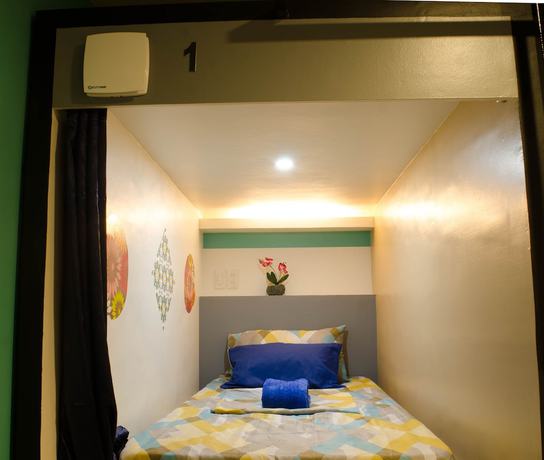 Imagen de la habitación del Hotel Napsule Suites Davao. Foto 16