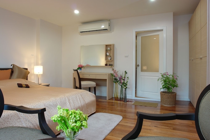 Imagen de la habitación del Hotel Nara Suite Residence Bangkok. Foto 7
