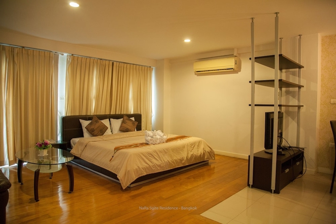 Imagen de la habitación del Hotel Nara Suite Residence Bangkok. Foto 14