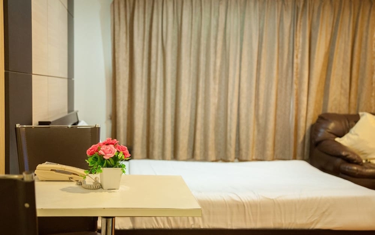Imagen de la habitación del Hotel Nara Suite Residence Bangkok. Foto 16