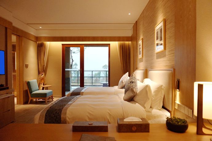Imagen de la habitación del Hotel Narada Resort and Spa Cifu Lake Guangxi. Foto 14