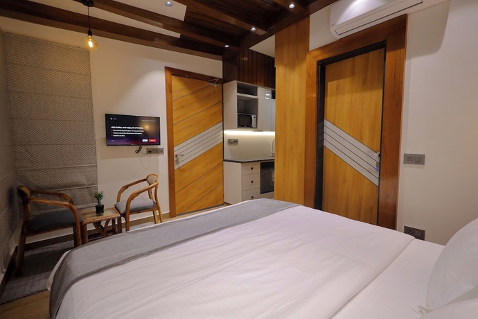 Imagen de la habitación del Hotel Narayana Homes. Foto 2