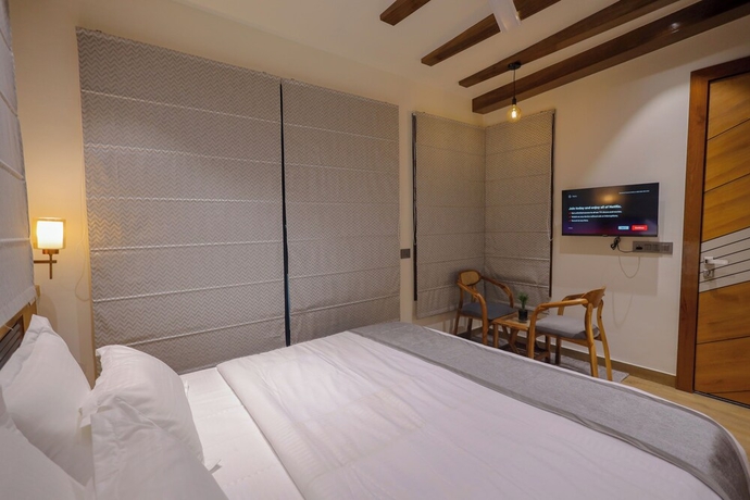 Imagen de la habitación del Hotel Narayana Homes. Foto 4
