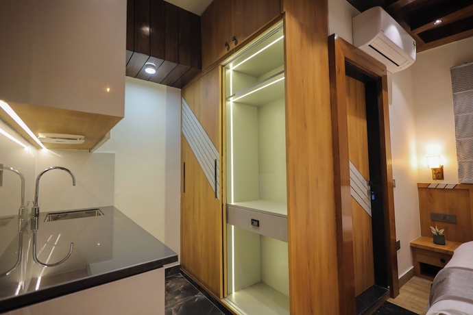 Imagen de la habitación del Hotel Narayana Homes. Foto 5