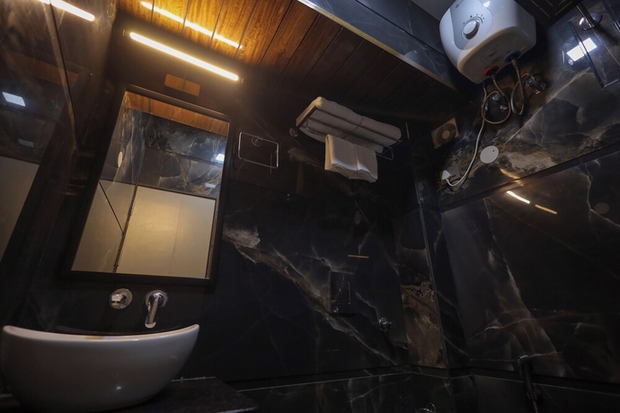 Imagen de la habitación del Hotel Narayana Homes. Foto 6