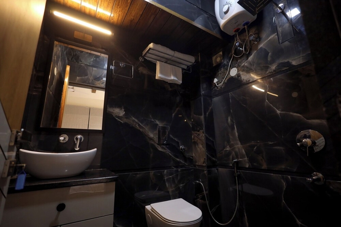 Imagen de la habitación del Hotel Narayana Homes. Foto 7