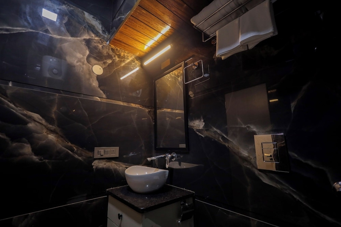 Imagen de la habitación del Hotel Narayana Homes. Foto 8
