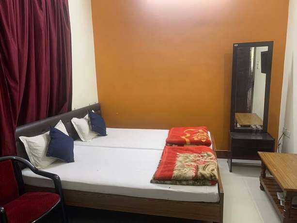 Imagen de la habitación del Hotel Narendra Guest House. Foto 5