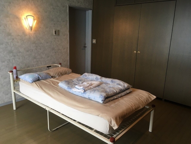 Imagen de la habitación del Hotel Narita Airport Samurai Hostel. Foto 7