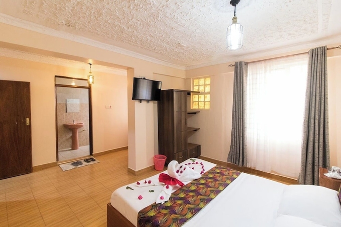 Imagen de la habitación del Hotel Narumoro Africa One. Foto 15
