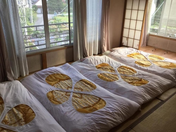 Imagen de la habitación del Hotel Narusawa Lodge. Foto 9