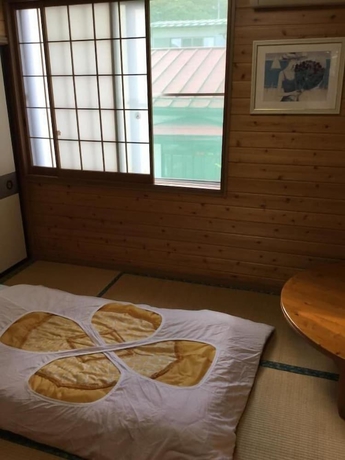 Imagen de la habitación del Hotel Narusawa Lodge. Foto 16