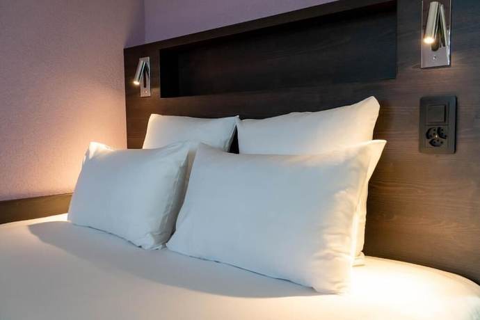 Imagen de la habitación del Hotel Nash Pratik. Foto 8