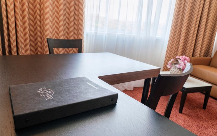 Imagen de la habitación del Hotel Nash Suites Airport. Foto 12