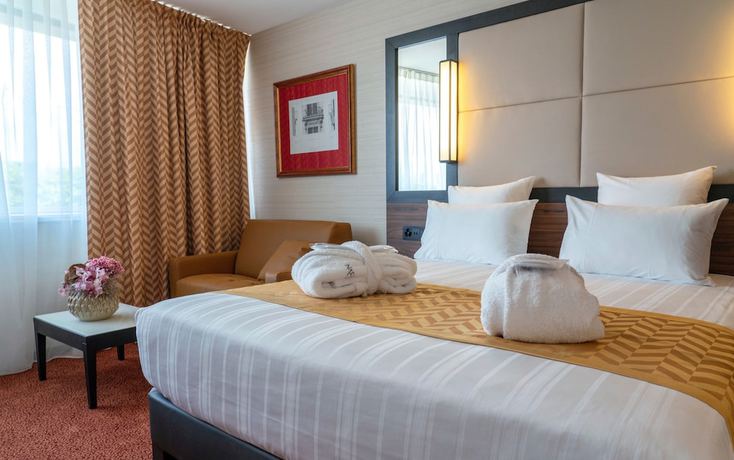 Imagen de la habitación del Hotel Nash Suites Airport. Foto 18