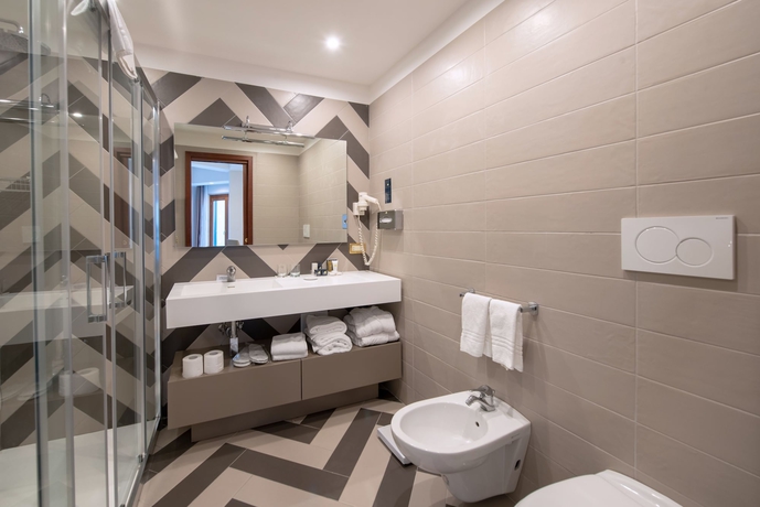 Imagen de la habitación del Hotel Nastro Azzurro Resort. Foto 11