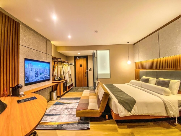 Imagen de la habitación del Hotel Nata Azana Solo. Foto 2