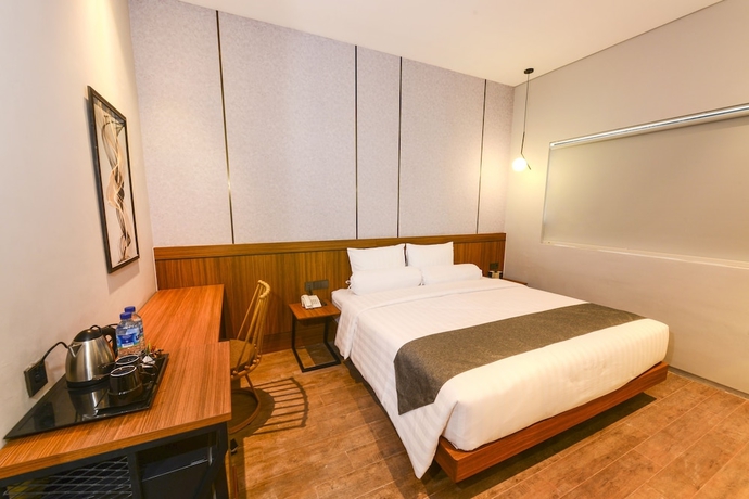 Imagen de la habitación del Hotel Nata Azana Solo. Foto 10