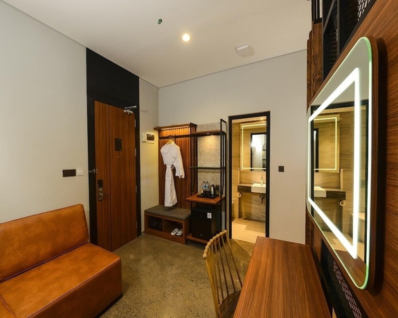 Imagen de la habitación del Hotel Nata Azana Solo. Foto 11