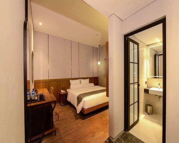 Imagen de la habitación del Hotel Nata Azana Solo. Foto 12