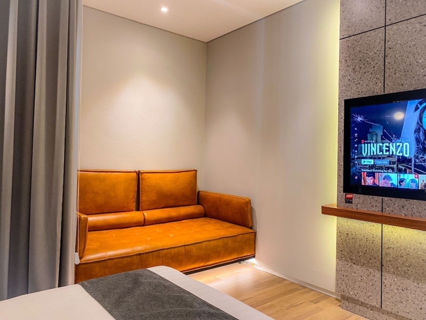 Imagen de la habitación del Hotel Nata Azana Solo. Foto 13