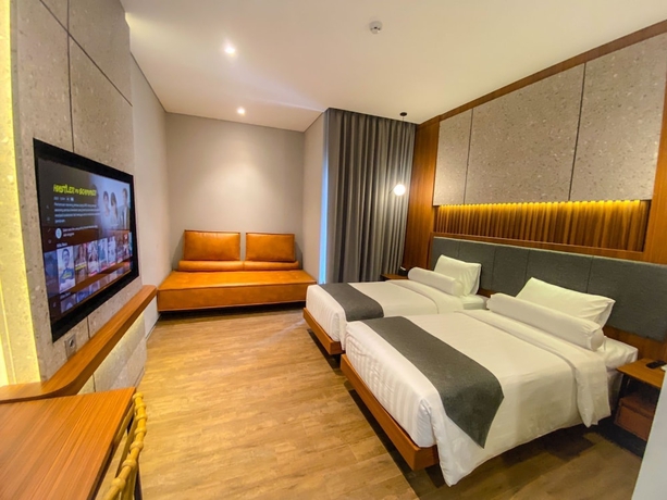 Imagen de la habitación del Hotel Nata Azana Solo. Foto 14