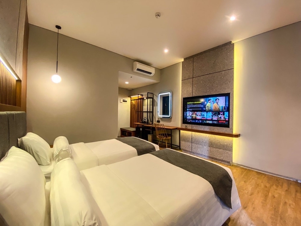 Imagen de la habitación del Hotel Nata Azana Solo. Foto 15