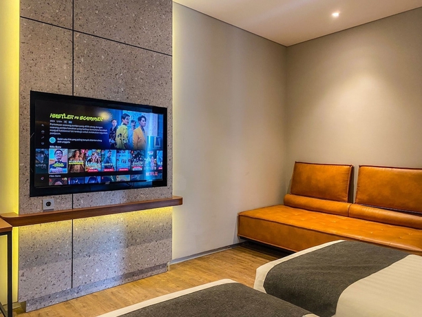 Imagen de la habitación del Hotel Nata Azana Solo. Foto 16