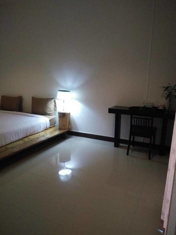 Imagen de la habitación del Hotel Natai House. Foto 9