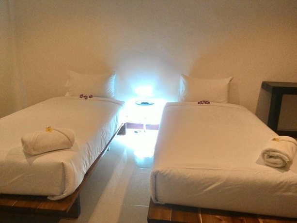 Imagen de la habitación del Hotel Natai House. Foto 11
