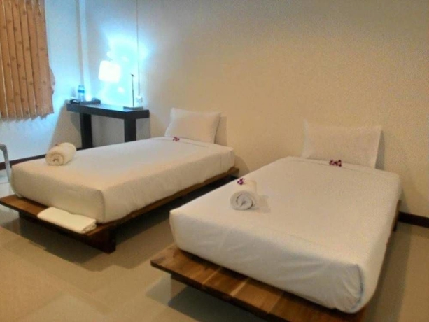 Imagen de la habitación del Hotel Natai House. Foto 13