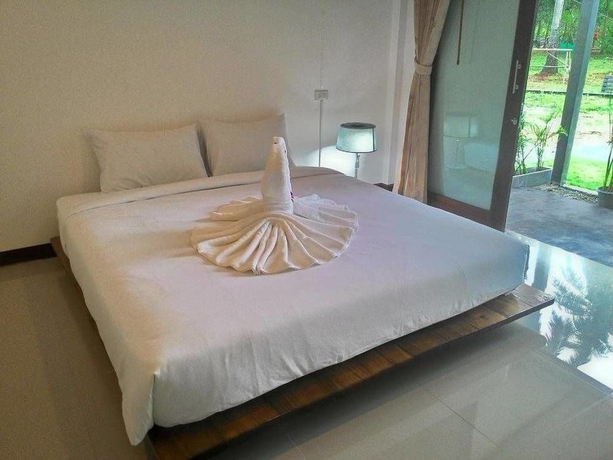 Imagen de la habitación del Hotel Natai House. Foto 14