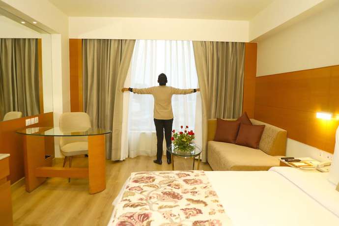 Imagen de la habitación del Hotel Nataraj Sarovar Portico Jhansi. Foto 3