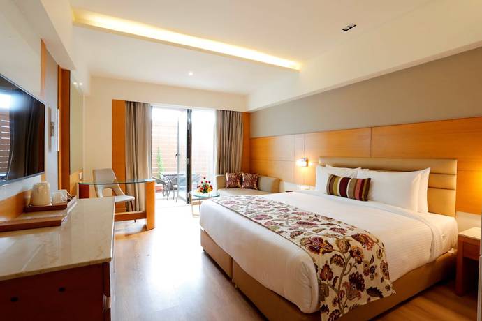 Imagen de la habitación del Hotel Nataraj Sarovar Portico Jhansi. Foto 4